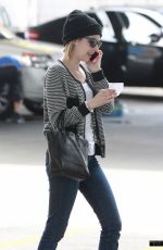 EMMA ROBERTS Heading to Car Wash in Los Angeles