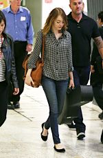 EMMA STONE Arrives at Airport in Sydney