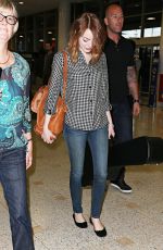 EMMA STONE Arrives at Airport in Sydney