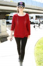 EMMY ROSSUM Arrives at LAX Airport in Los Angeles