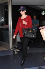 EMMY ROSSUM Arrives at LAX Airport in Los Angeles