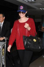 EMMY ROSSUM Arrives at LAX Airport in Los Angeles