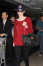EMMY ROSSUM Arrives at LAX Airport in Los Angeles