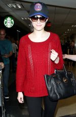 EMMY ROSSUM Arrives at LAX Airport in Los Angeles