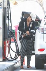 HALLE BERRY at a Gas Station in Los Angeles