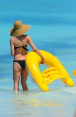 HEIDI KLUM in Bikini at a Beach in Bahamas