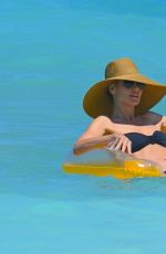 HEIDI KLUM in Bikini at a Beach in Bahamas