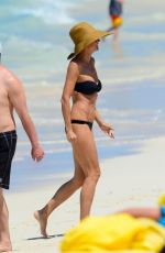 HEIDI KLUM in Bikini at a Beach in Bahamas