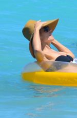 HEIDI KLUM in Bikini at a Beach in Bahamas