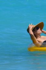 HEIDI KLUM in Bikini at a Beach in Bahamas