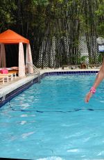 JENNIFER NICOLE LEE in Animal Print Swimsuit at a Pool in Miami