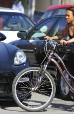 KARREUCHE TRAN Riding a Bike in Venice