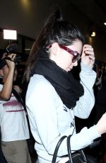 KENDALL JENNER Arrives at LAX in Los Angeles