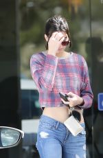 KENDALL JENNER in Ripped Jeans Out in Los Angeles