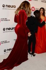 KIM, KHLOE and KOURNEY KARDASHIAN at Elton John Aids Foundation Oscar Party in Los Angeles