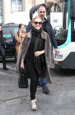 KYLIE MINOGUE Arrives at Gare du Nord in Paris