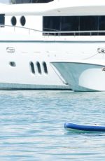 LUCY MECKLENBURGH in Bikini Paddleboarding in Miami