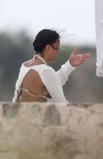 MICHELLE RODRIGUEZ and CARA DELEVINGNE Cuddle on a Beach