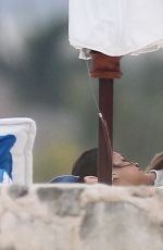 MICHELLE RODRIGUEZ and CARA DELEVINGNE Cuddle on a Beach