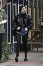 MILEY CYRUS at the District Donut and Coffee Shop in New Orleans