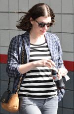 MILLA JOVOVICH Out and About in Los Angeles