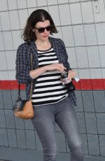 MILLA JOVOVICH Out and About in Los Angeles