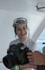 MIRANDA COSGROVE at Oceanup Swimming with Dolphins Campaign