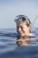 MIRANDA COSGROVE at Oceanup Swimming with Dolphins Campaign