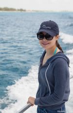 MIRANDA COSGROVE Swiming with Dolphins in Bahamas
