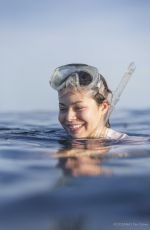 MIRANDA COSGROVE Swiming with Dolphins in Bahamas