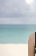 MIRANDA COSGROVE Swiming with Dolphins in Bahamas