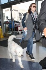 OLIVIA WILDE Arrives at LAX Airport in Los Angeles