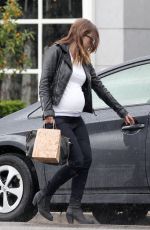 OLIVIA WILDE on a Rainy Day Out in Los Angeles