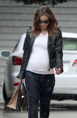 OLIVIA WILDE on a Rainy Day Out in Los Angeles