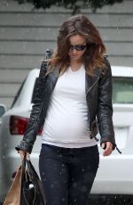 OLIVIA WILDE on a Rainy Day Out in Los Angeles
