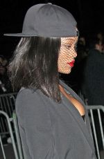 RIHANNA at Givency Fashion Show in Paris