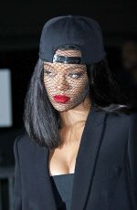 RIHANNA at Givency Fashion Show in Paris