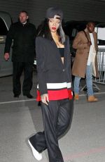RIHANNA at Givency Fashion Show in Paris
