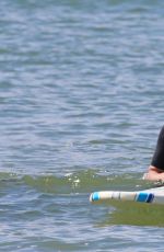 ROSAMUND PIKE in Bikini Paddle Boarding in Hawaii