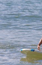 ROSAMUND PIKE in Bikini Paddle Boarding in Hawaii
