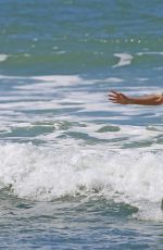ROSAMUND PIKE in Bikini Paddle Boarding in Hawaii