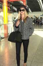 ROSIE HUNTINGTON-WHITELEY Arrives at Heatrow Airport in London