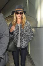 ROSIE HUNTINGTON-WHITELEY Arrives at Heatrow Airport in London