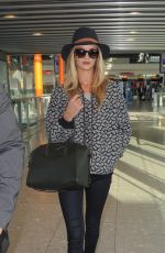 ROSIE HUNTINGTON-WHITELEY Arrives at Heatrow Airport in London