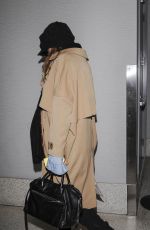SCARLETT JOHANSSON Arrives at LAX Airport in Los Angeles