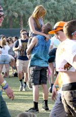 BELLA THORNE and Tristan Klier at Coachella Valley Music and Arts Festival