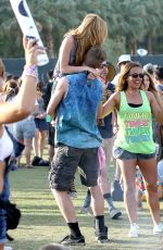 BELLA THORNE and Tristan Klier at Coachella Valley Music and Arts Festival