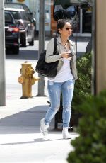 BRENDA SONG Leaves Hugos Restaurant in West Hollywood