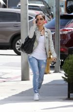BRENDA SONG Leaves Hugos Restaurant in West Hollywood
