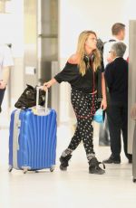 CARA DELEVINGNE and MICHELLE RODRIGUEA Arrives at Miami Airport